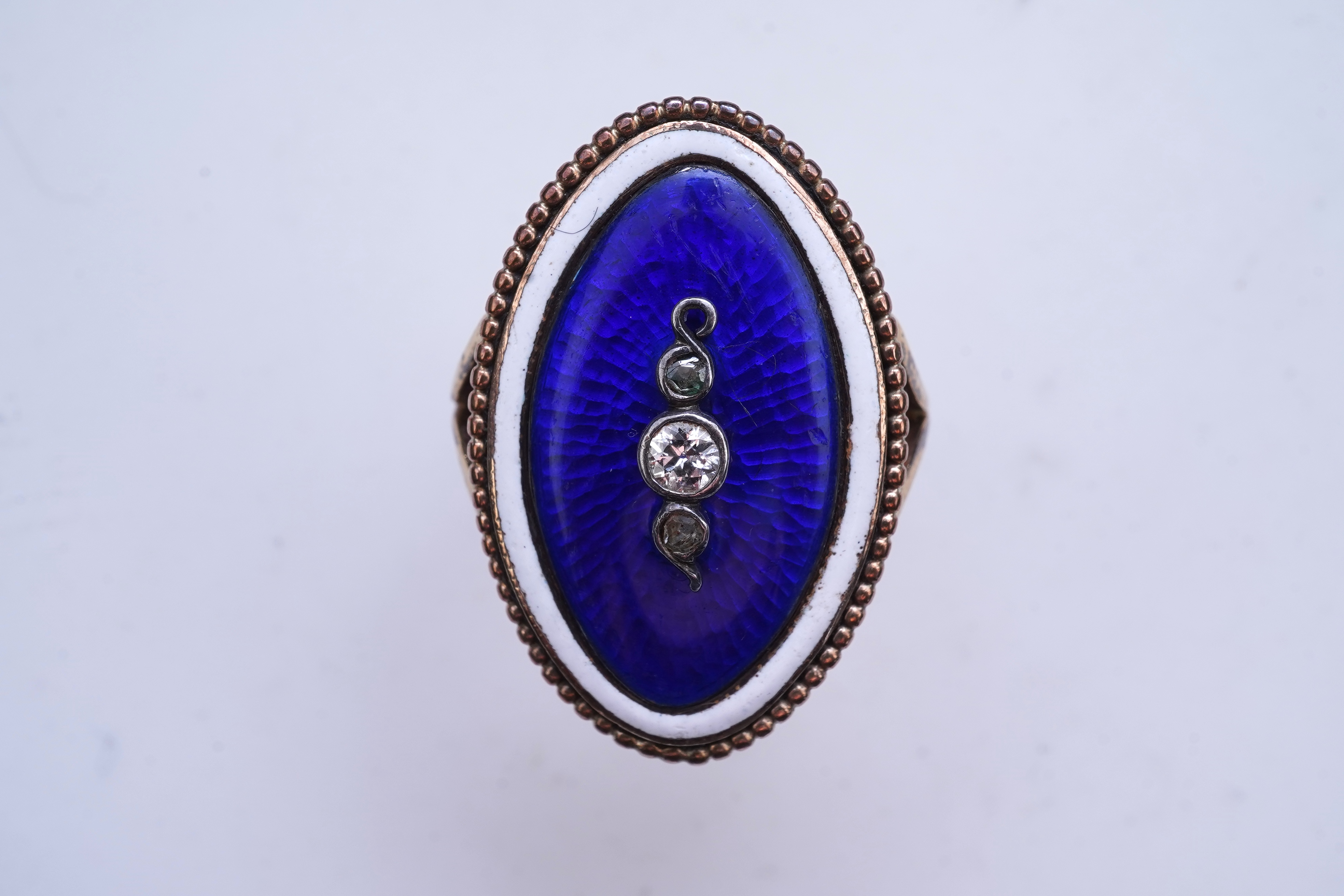 An enamel and diamond mourning ring, late 19th century